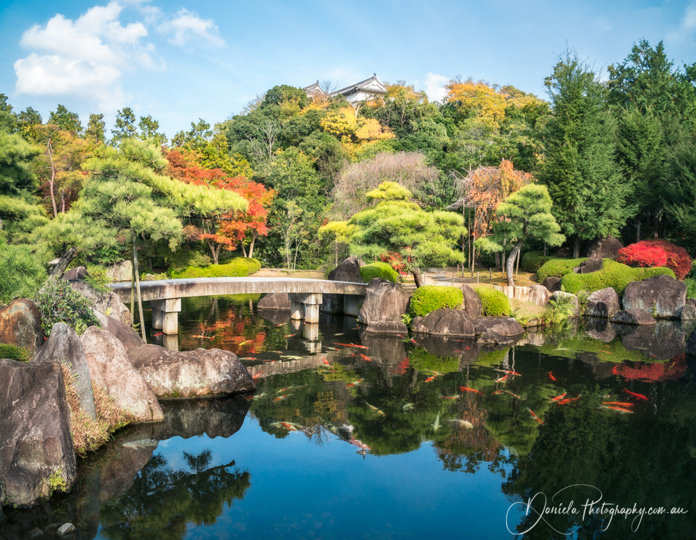 Small stone bridge at Koko en Garden in autumn in Himeji